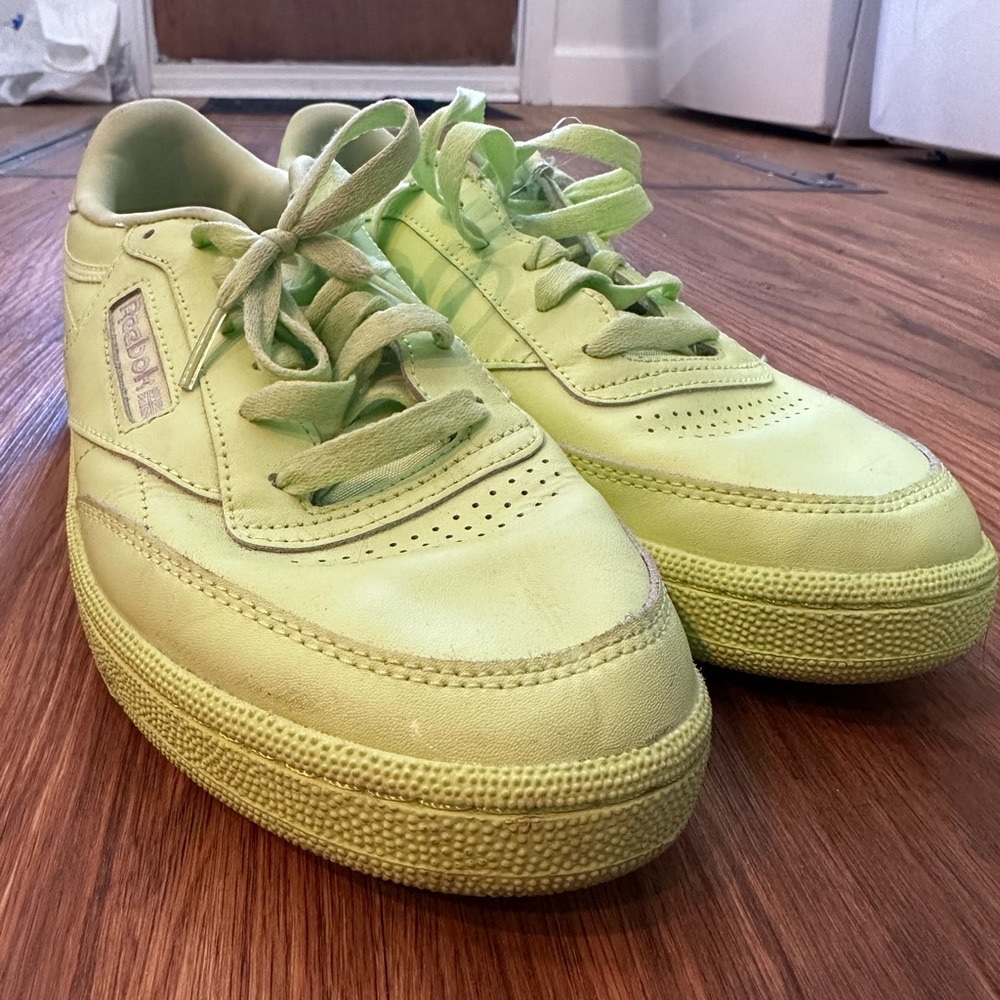 Green Reebok sneakers